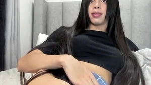 lengthy black Hair Transgirl Tugs Her thick weenie On cam